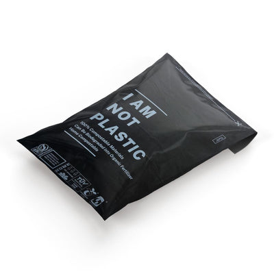 100% black compostable mailing bag with the words ' I am not plastic ' 