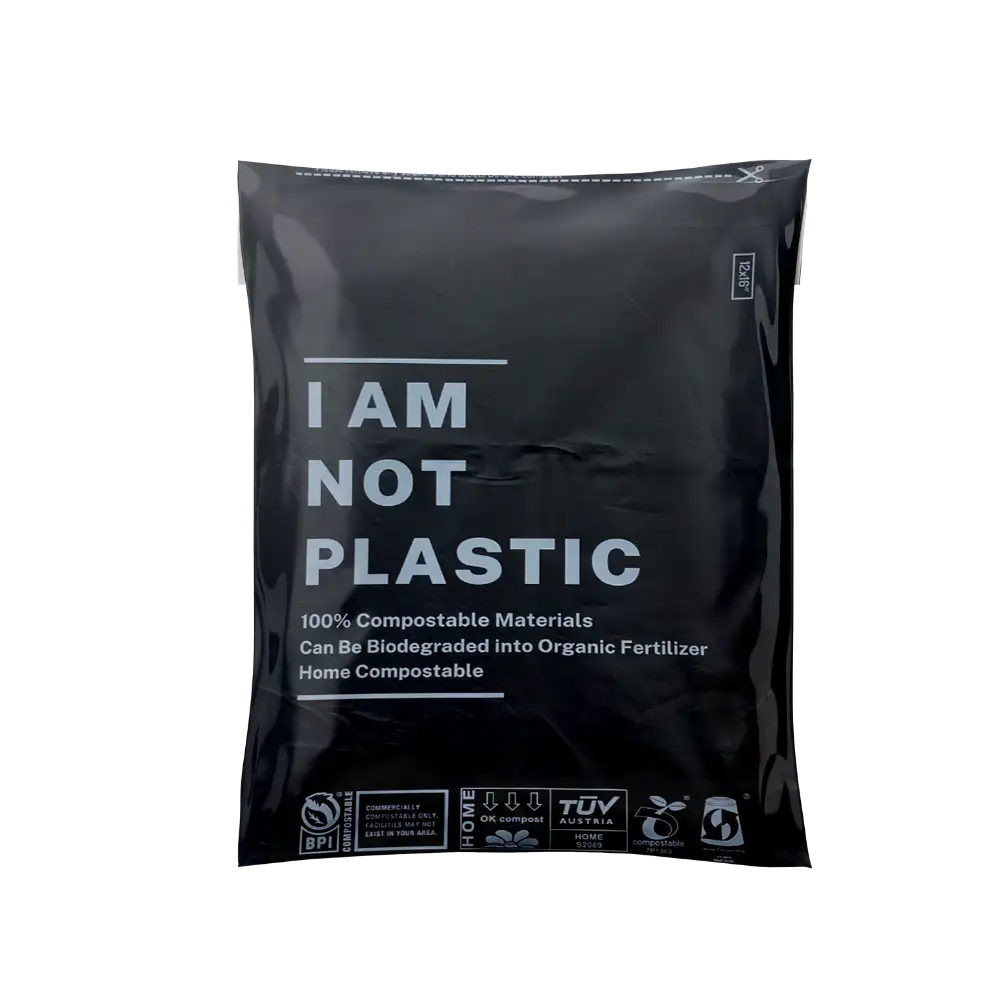 Black compostable bag with 'I AM NOT PLASTIC' text on a white background