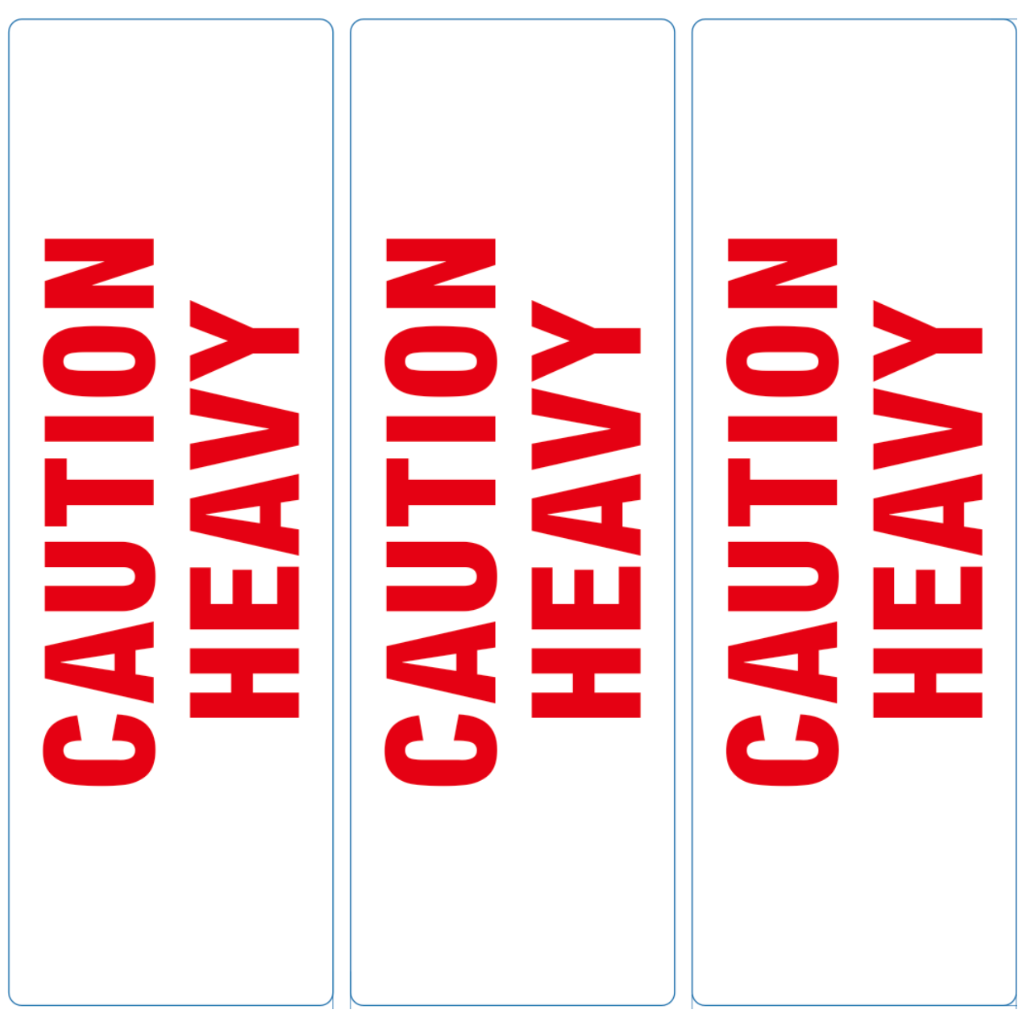 CAUTION HEAVY label design in red