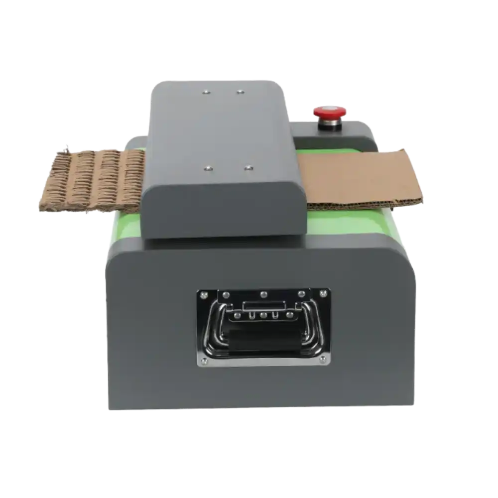 Cardboard shredder in use at the side