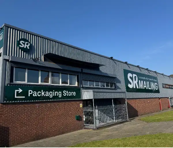 Great Ducie packaging store front with grass out front