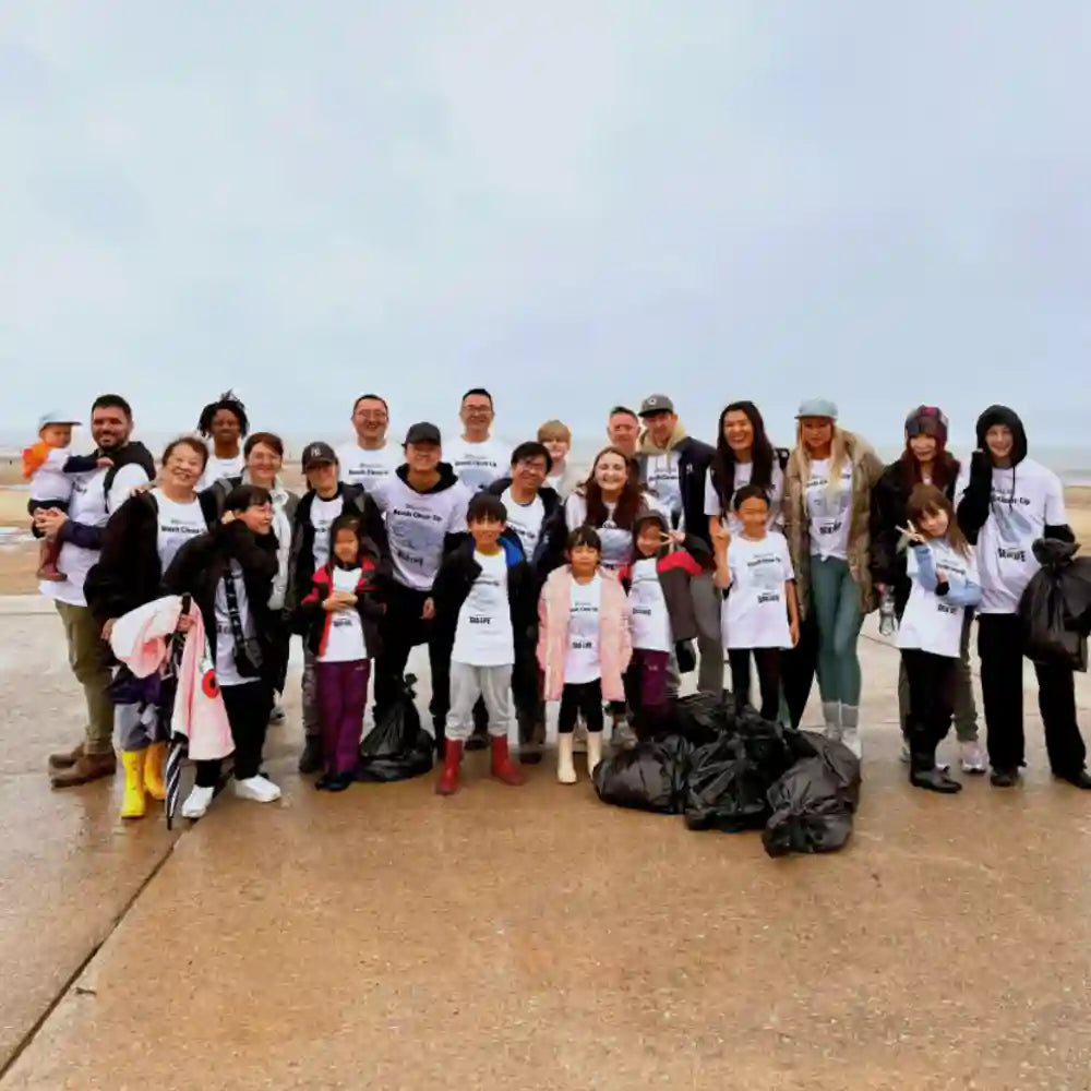 Group of workers after beach cleanup in collaboration with SeaLife
