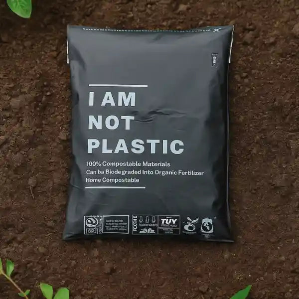 Compostable Mail Bag in black on earthy background