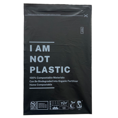 10" X 14" Black Compostable mailing bag with the text ' I AM NOT PLASTIC ' written