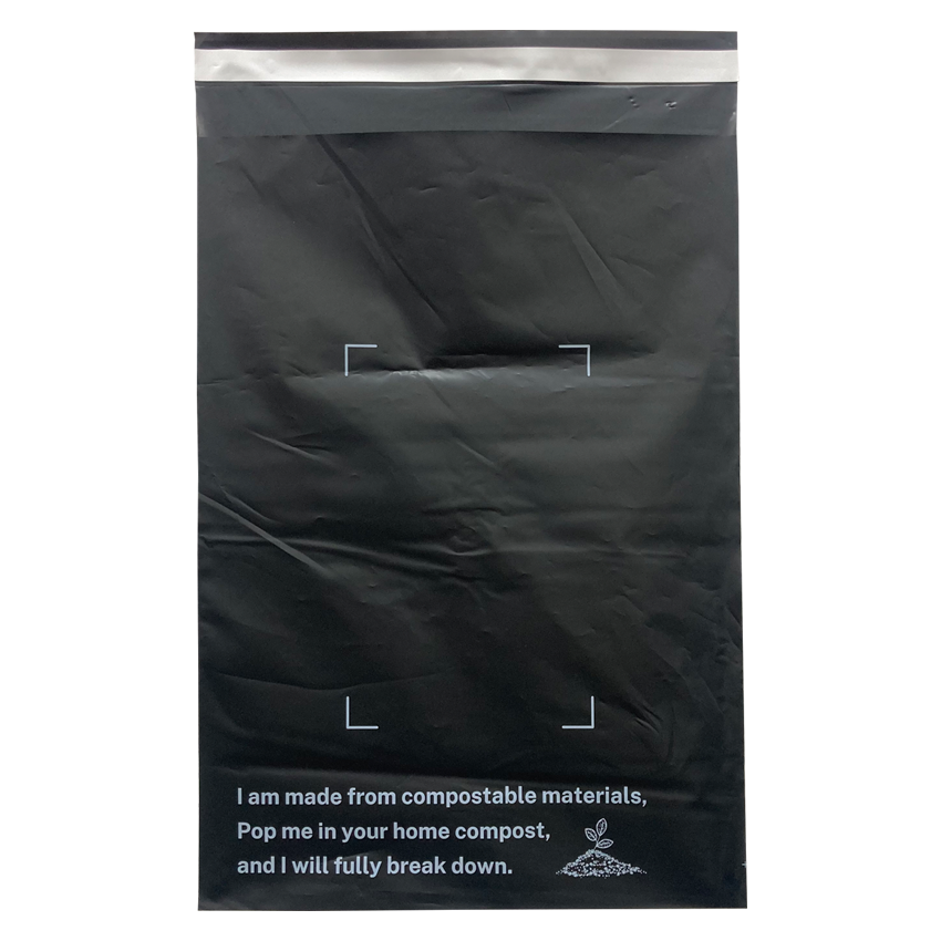 Back of 10" X 14" Black Compostable mailing bag with the text ' I AM NOT PLASTIC ' written