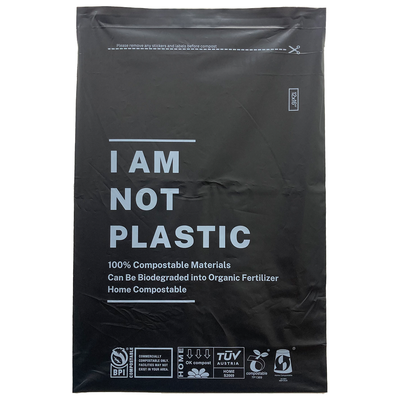 12" X 16" Black Compostable mailing bag with the text ' I AM NOT PLASTIC ' written